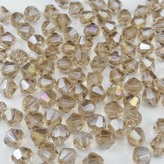Pinhoollgo 500pcs 4mm Bicone Crystal Glass Beads Faceted Bicone Crystal Beads Bulk Glass Spacer Beads for Bracelets Necklace Pendants Earrings DIY Jewelry Craft Making(Champagne AB)