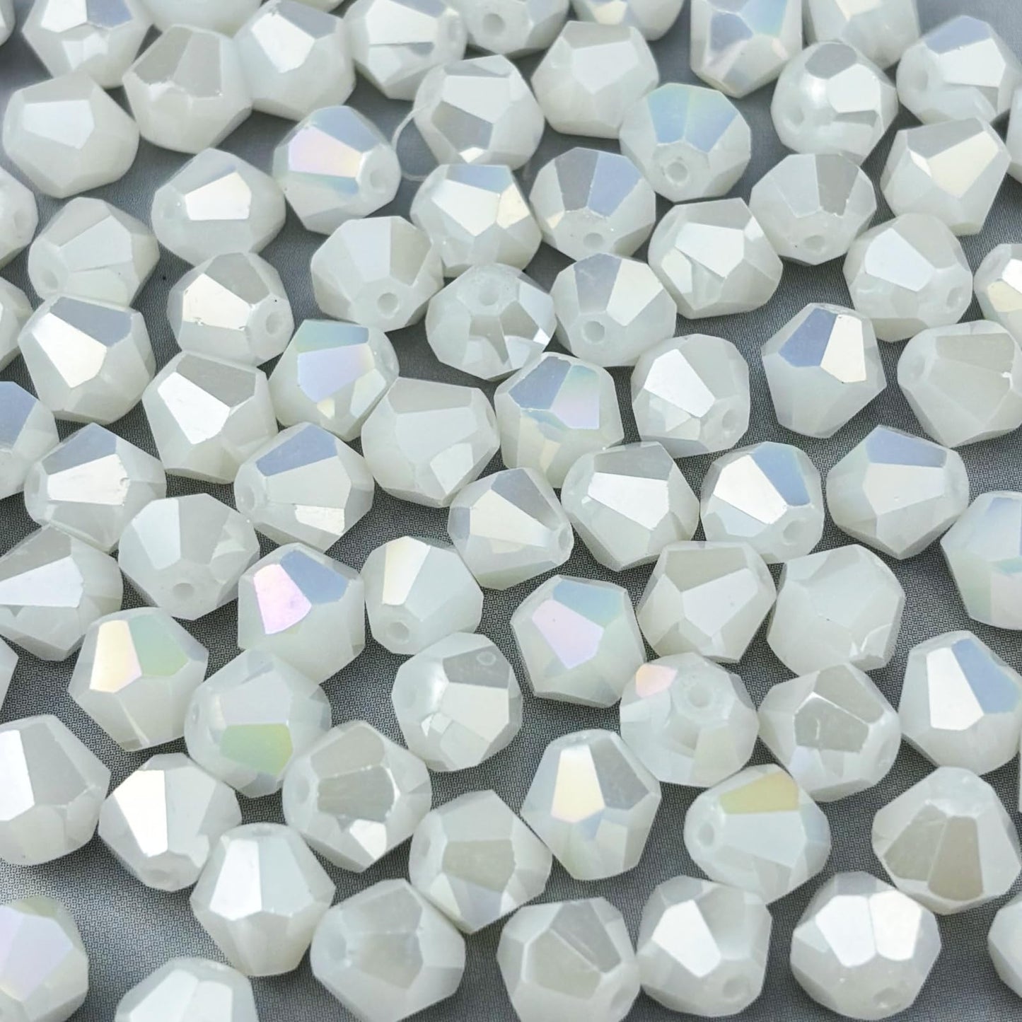 Pinhoollgo 500pcs 4mm Bicone Crystal Glass Beads Faceted Bicone Crystal Beads Bulk Glass Spacer Beads for Bracelets Necklace Pendants Earrings DIY Jewelry Craft Making(White Jade AB)