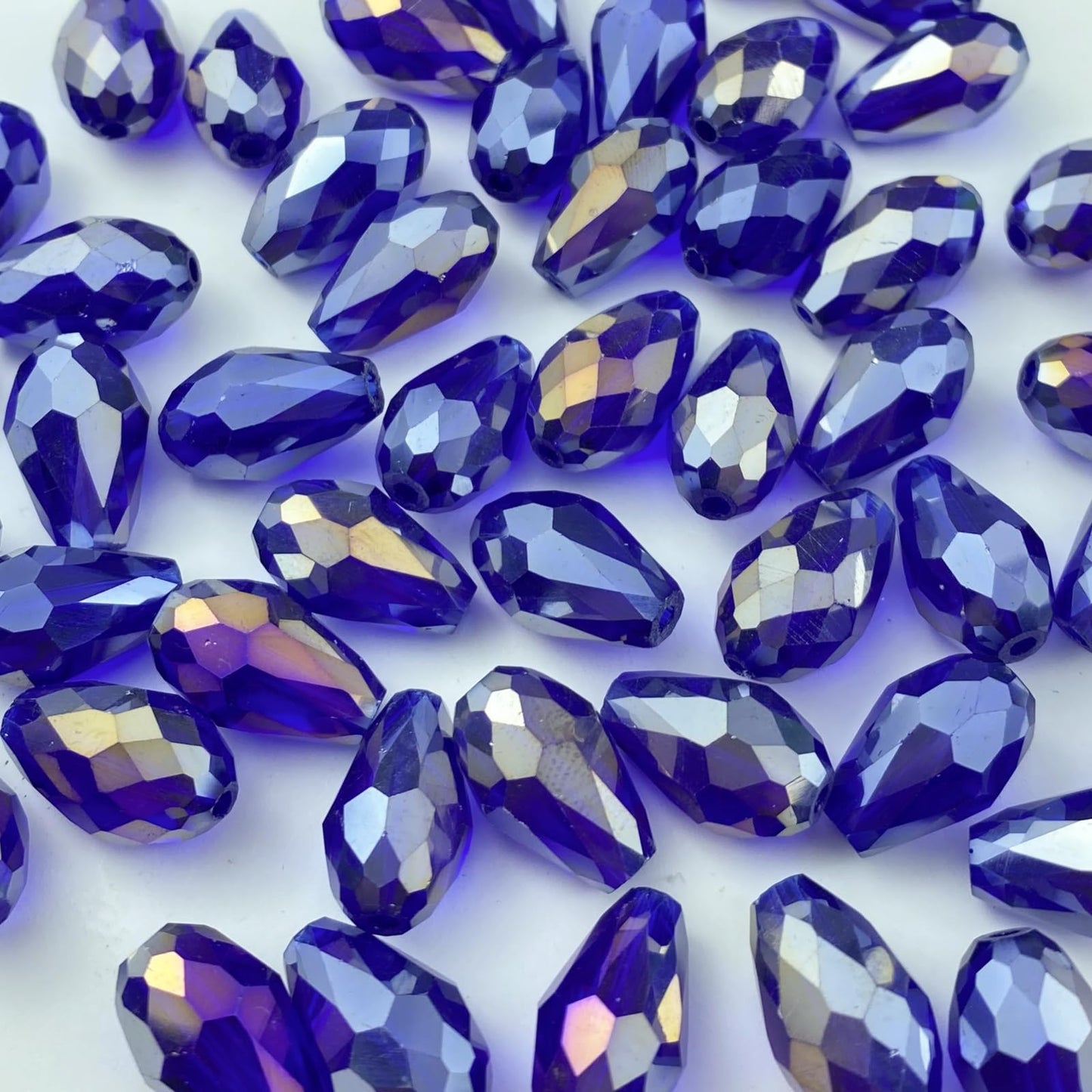 Honkoolly 50pcs 10x15mm Teardrop Crystal Glass Beads Vertical Hole Faceted Glass Teardrop Spacer Beads for Bracelets Necklace Earring DIY Jewelry Making Craft(Sapphire Blue AB)