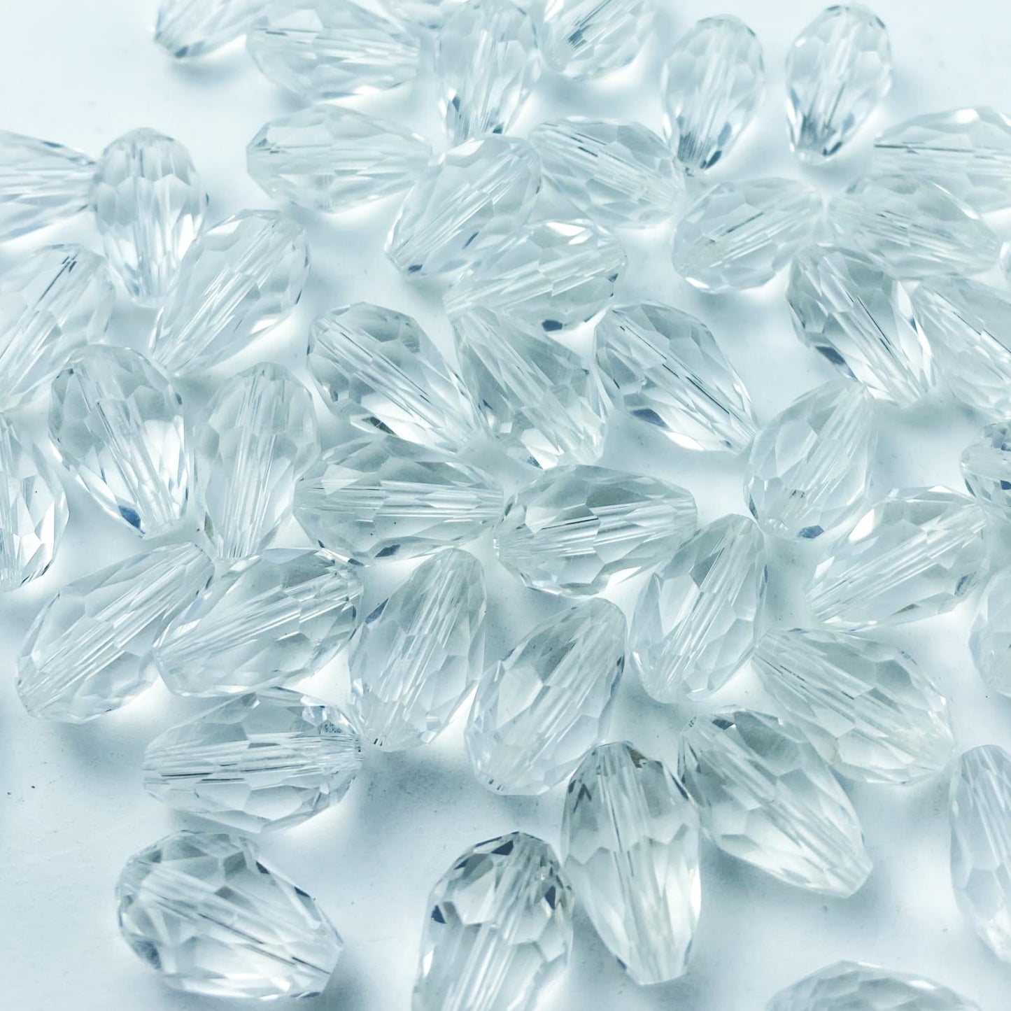 Honkoolly 100pcs 8x12mm Teardrop Crystal Glass Beads Vertical Hole Faceted Glass Teardrop Spacer Beads for Bracelets Necklace Earring DIY Jewelry Making Craft(Transparent)
