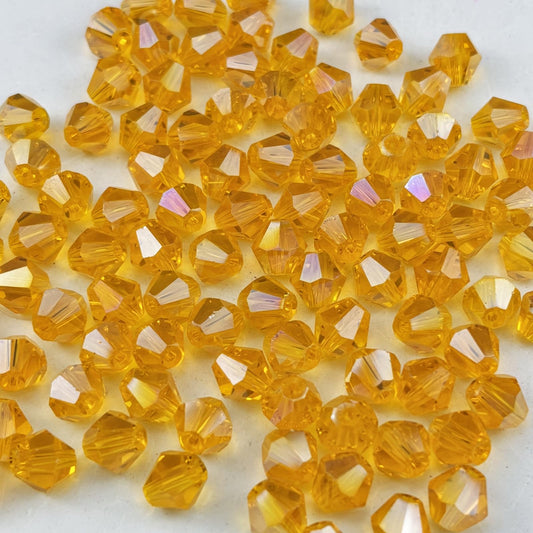 Pinhoollgo 500pcs 4mm Bicone Crystal Glass Beads Faceted Bicone Crystal Beads Bulk Glass Spacer Beads for Bracelets Necklace Pendants Earrings DIY Jewelry Craft Making(Orange AB)