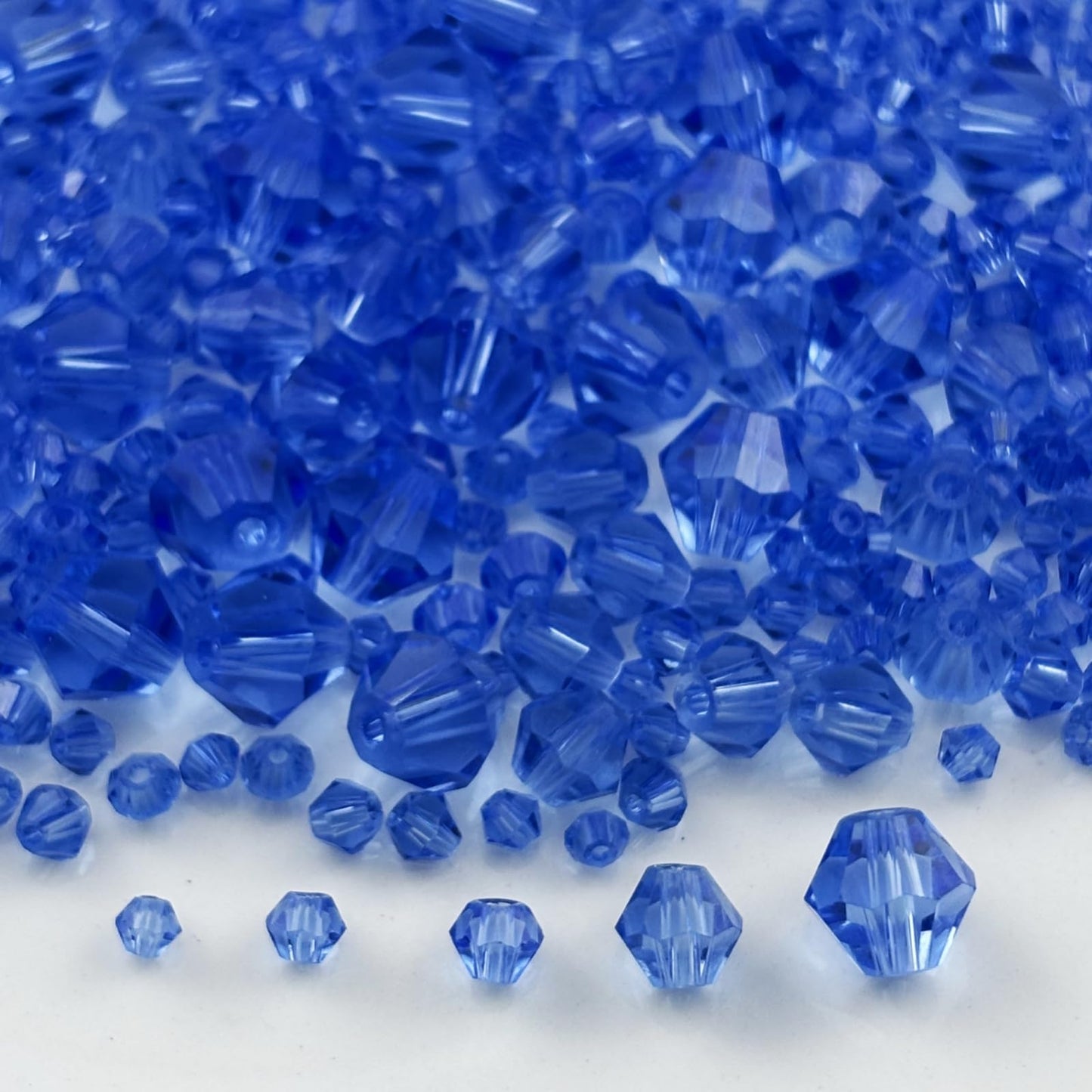 Pinhoollgo 1310pcs Bicone Crystal Glass Beads 2mm 3mm 4mm 6mm 8mm Faceted Crystal Spacer Beads for Bracelets Necklace Pendants Earrings DIY Jewelry Craft Making(Light Blue)