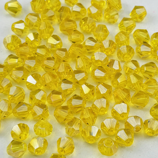 Pinhoollgo 600pcs 3mm Bicone Crystal Glass Beads Faceted Bicone Crystal Beads Bulk Glass Spacer Beads for Bracelets Necklace Pendants Earrings DIY Jewelry Craft Making(Gold Yellow AB)
