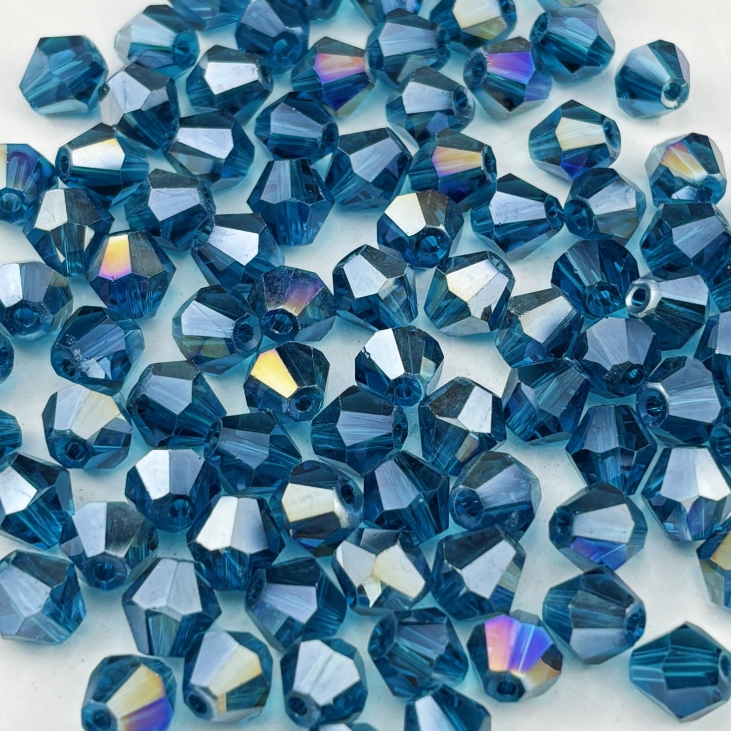 Pinhoollgo 100pcs 8mm Bicone Crystal Glass Beads Faceted Bicone Crystal Beads Bulk Glass Spacer Beads for Bracelets Necklace Pendants Earrings DIY Jewelry Craft Making(Peacock Blue AB)