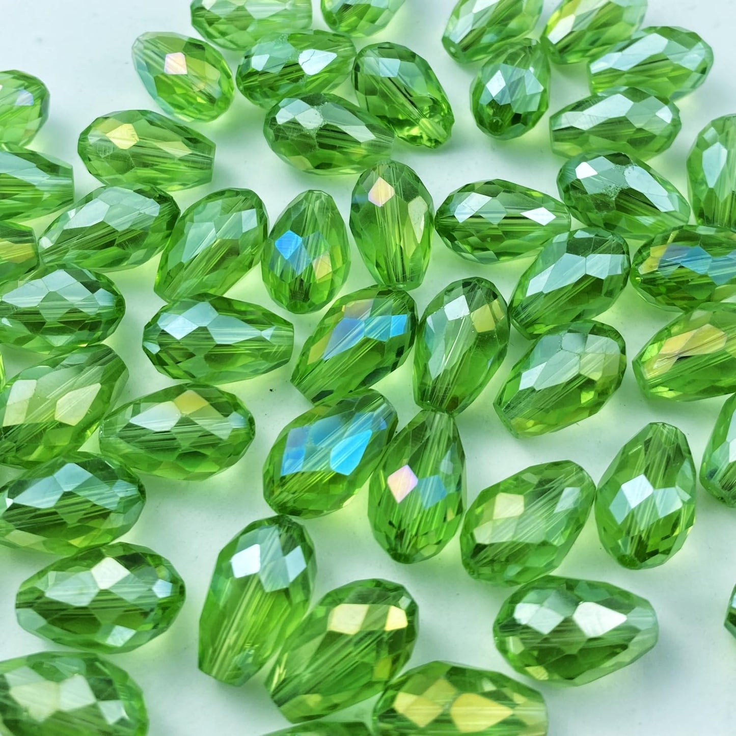 Honkoolly 50pcs 10x15mm Teardrop Crystal Glass Beads Vertical Hole Faceted Glass Teardrop Spacer Beads for Bracelets Necklace Earring DIY Jewelry Making Craft(Light Green AB)