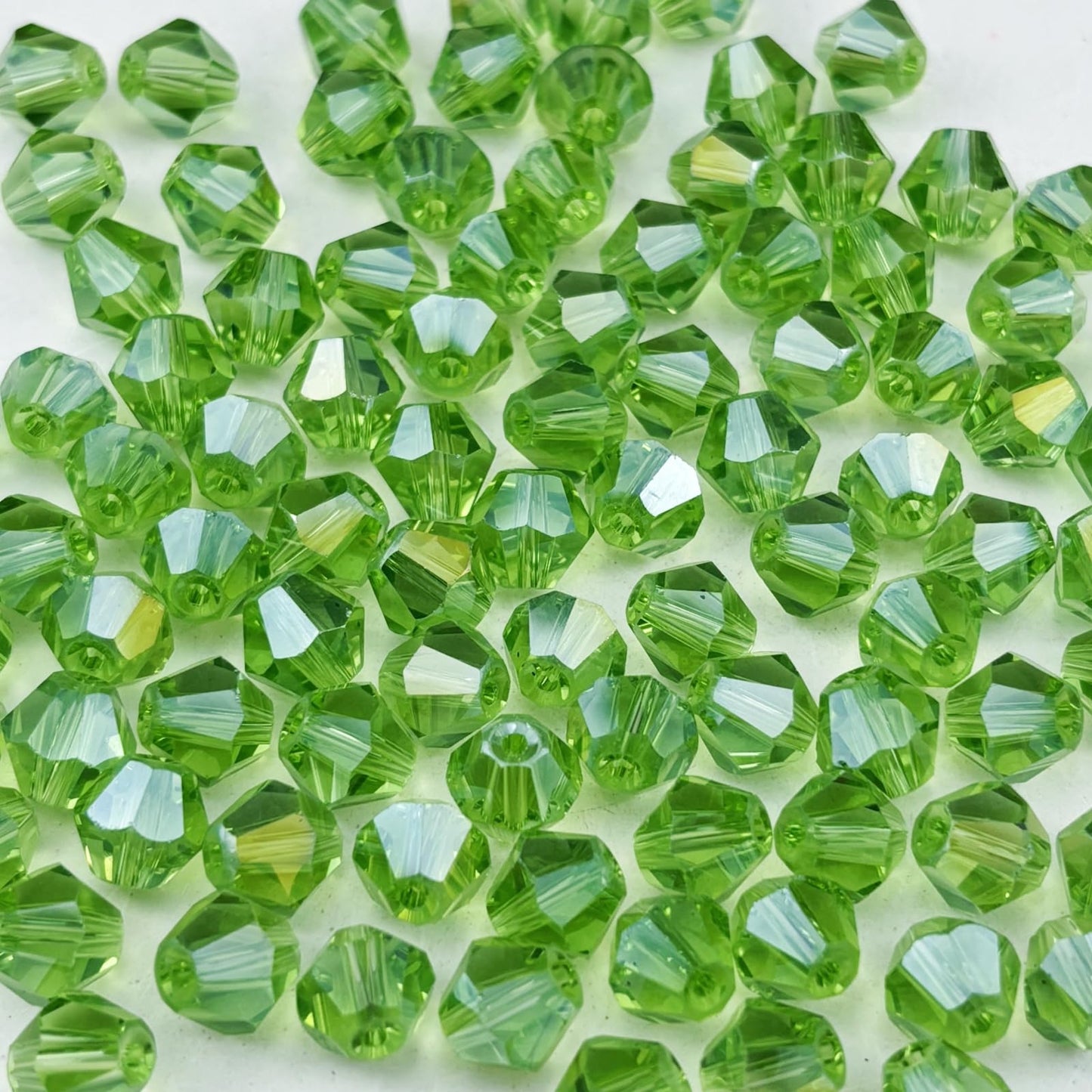 Pinhoollgo 500pcs 4mm Bicone Crystal Glass Beads Faceted Bicone Crystal Beads Bulk Glass Spacer Beads for Bracelets Necklace Pendants Earrings DIY Jewelry Craft Making(Light Green AB)